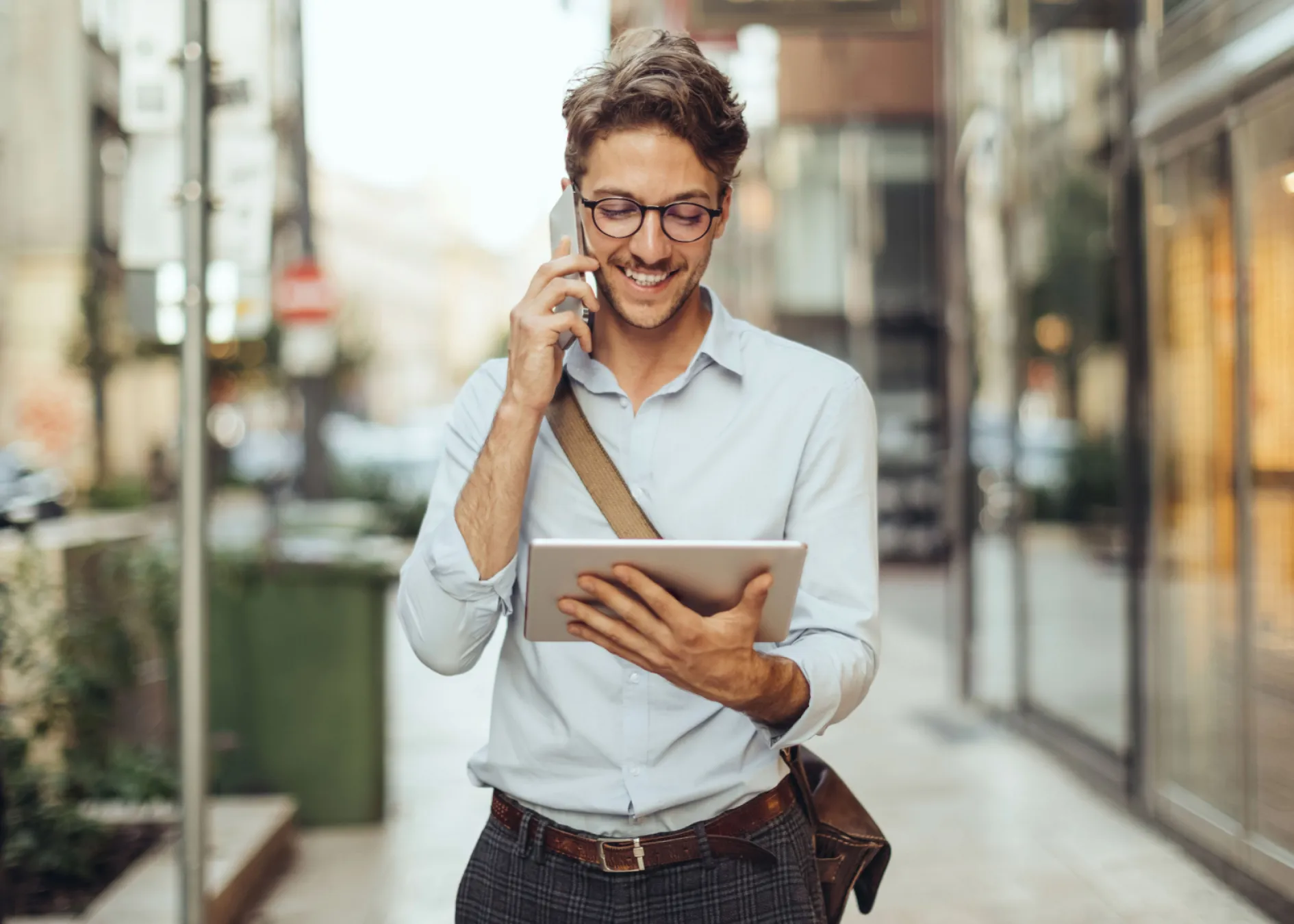 Checkout.com expert talking to a client on a phone. 