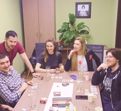 DataForest team playing board game

